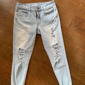 Light wash ripped American Eagle skinny jeans